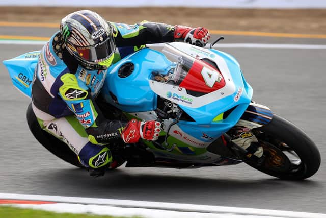 John McGuinness on the Blue Earth Construction Ducati at Brands Hatch.