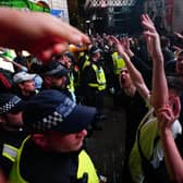England fans clash with police in Piccadilly Circus, London, after Italy beat England on penalties to win the UEFA Euro 2020 Final