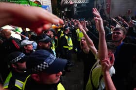 England fans clash with police in Piccadilly Circus, London, after Italy beat England on penalties to win the UEFA Euro 2020 Final