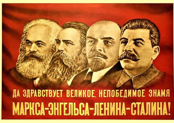 A Soviet-era flag depicting Marx, Engels, Lenin and Stalin