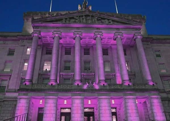 Stormont has been lit up for a number of occasions including International Women's Day (pictured)