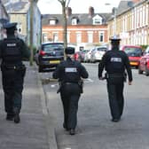PSNI officers on patrol in the Holyland area of Belfast, home to a large number of student tenants