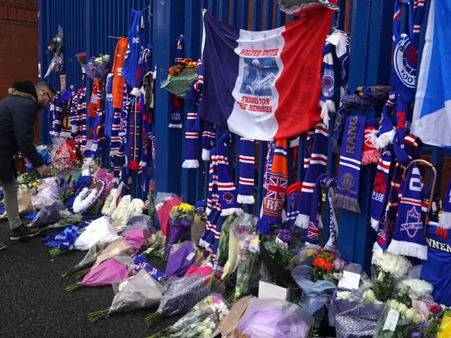 Tributes are laid at Ibrox Stadium in memory of former Scotland, Rangers and Everton manager Walter Smith who has died aged 73. Photo: Andrew Milligan/PA Wire.