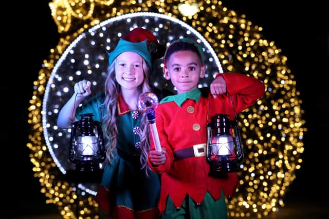 Elves Jessica and Giovanni celebrate the return of the Enchanted Winter Garden, at Antrim Castle Gardens. Picture by Darren Kidd/PressEye