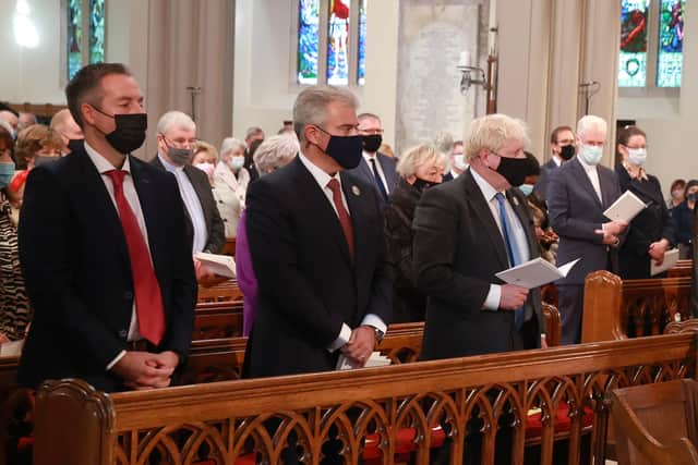 (left to right) First Minister of NI Paul Givan, NI Secretary Brandon Lewis and Prime Minister Boris Johnson at the Armagh centenary service. It was a damp quib. The organisers appear to have been more concerned to avoid offending nationalists than to offer anything positive