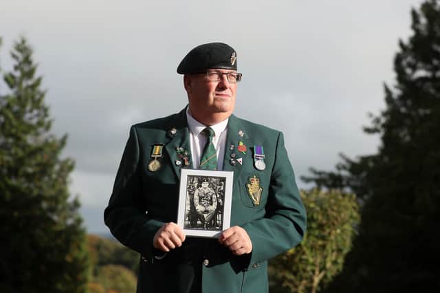 Former UDR member William Harron, holds a photograph of his brother Thomas Harron, also a UDR member, who was killed during the Troubles, as he attends an event at Corick House, Clogher, Co. Tyrone, for former UDR members and families of UDR soldiers killed during the Troubles, in relation to a proposed statute of limitations on future prosecutions for crimes committed during the conflict. Picture date: Thursday October 28, 2021. The Government announced in July plans for a statute of limitations that would end all prosecutions for Troubles incidents up to April 1998. PA Photo. See PA story ULSTER Legacy Victims. Photo credit should read: Brian Lawless/PA Wire