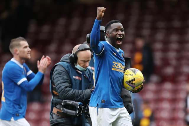 Fashion Sakala of Rangers celebrates with the match ball after scoring a hat-trick during the Cinch Scottish Premiership match against Motherwell