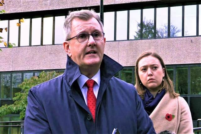 DUP leader Sir Jeffrey Donaldson speaks to the media during a press conference outside Castle Buildings, Stormont, Belfast, as party colleague Deborah Erskine looks on. Picture date: Monday November 1, 2021.