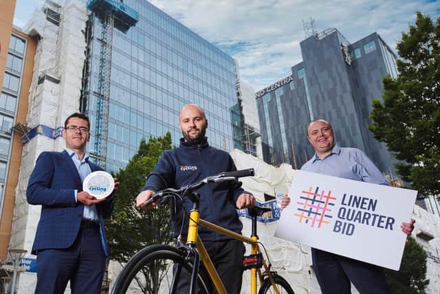 Pictured at the £85m Ewart in Belfast, the first Grade A listed building ever to achieve Cycling UK’s Cycle Friendly Employer accreditation for Developments is Paul Beacom, MRP,  James Palser of Cycling UK and Eamon Butler, CBRE NI
