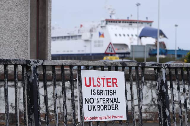A sign protesting against the Northern Ireland Protocol in Larne Harbour earlier this year.
