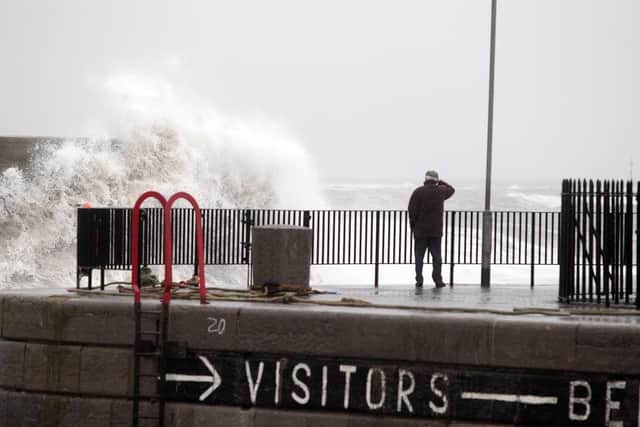 Waves from the Irish Sea batter the walls at Donaghadee harbour in Co. Down