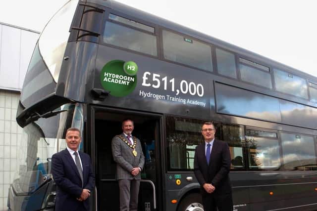 The Mayor of Mid and East Antrim, Cllr William McCaughey with Graham Whitehurst, MTF Chair and Neil Collins, Wrightbus managing director