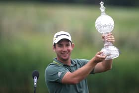 Lucas Herbert celebrates with the trophy after winning the Dubai Duty Free Irish Open on day four at Mount Juliet Estate golf course, Thomastown, Co Kilkenny. Picture date: Sunday July 4, 2021.