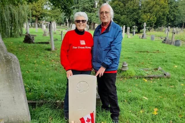Diana Beaupré and Adrian Watkinson at the grave of Henry Thomas Hobbs which they located in Surrey