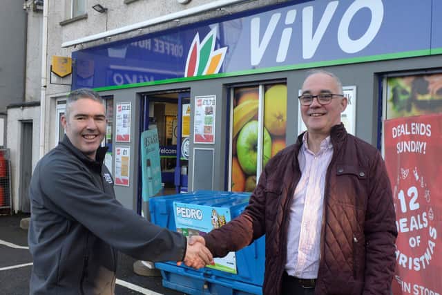 Aidan Walters is pictured with Sean McCullagh as he takes over the popular Vivo Essentials store in Plumbridge. The store first opened to serve the village in the early 1900s, becoming the store it is today in 1991