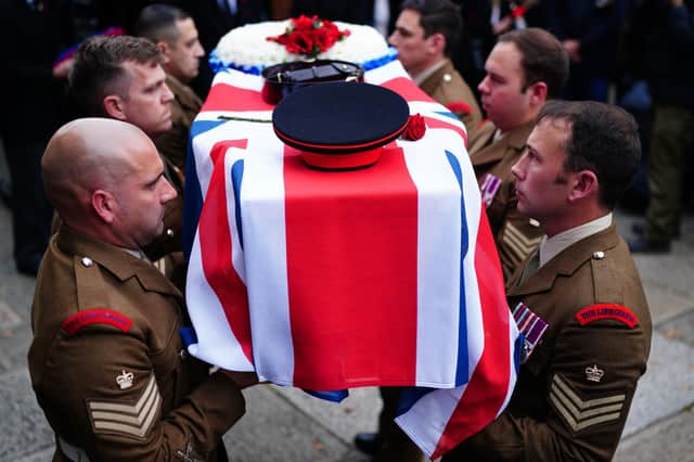 Members of the military acting as the bearer party carry the coffin from the funeral of Dennis Hutchings, who died after contracting Covid-19 while he was in Belfast to face trial over a fatal shooting incident in Co Tyrone in 1974, at St Andrew's Church in Plymouth. Picture date: Thursday November 11, 2021. PA Photo. See PA story FUNERAL Hutchings . Photo credit should read: Ben Birchall/PA Wire