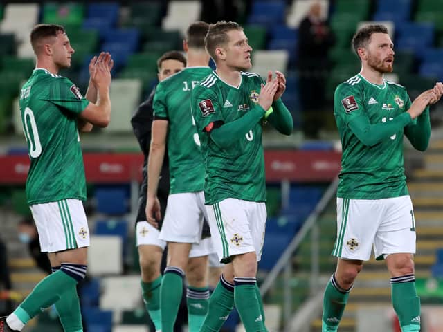 Northern Ireland players salute the supporters following victory over Lituania in Belfast. Pic by PresEye Ltd