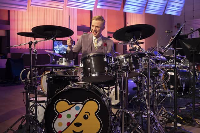 BBC weatherman Owain Wyn Evans who has completed his 24-hour drumathon for Children In Need, raising more than £1.6 million for the charity.