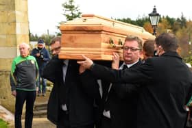 The coffin of civil rights leader Austin Currie is carried to his second funeral service at St Malachy's Church in Edendork, Co Tyrone, before burial in the adjoining cemetery. Picture date: Saturday November 13, 2021.