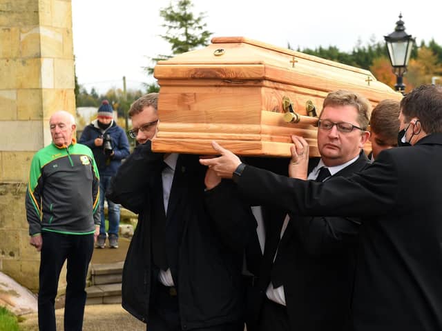 The coffin of civil rights leader Austin Currie is carried to his second funeral service at St Malachy's Church in Edendork, Co Tyrone, before burial in the adjoining cemetery. Picture date: Saturday November 13, 2021.