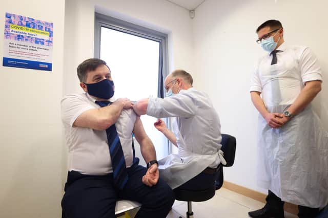The health minister Robin Swann getting a Covid vaccine earlier this year. But he won’t even agree that patients and their families have the right to ask which staff in a particular care home or hospital are not vaccinated