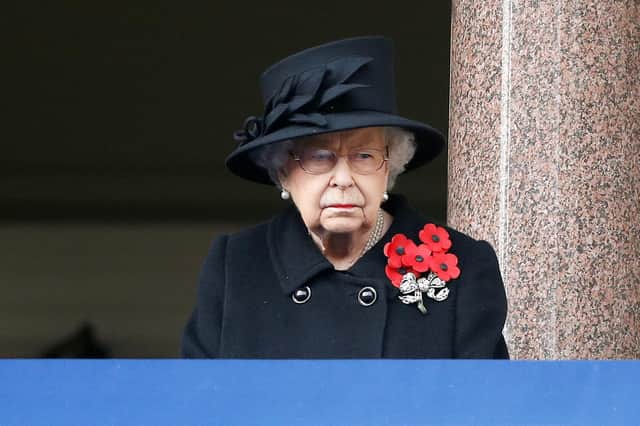 Queen Elizabeth II stands on a balcony in Whitehall during last year's  Remembrance Sunday service at the Cenotaph, in Whitehall, London.