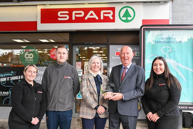 Faghan Valley Service Station owners Asrun and John McClean (centre) are joined by team members (from left) Samantha Cooke, Joshua Cunningham and Jenna Cooke as they celebrate 30 years of serving the local community with SPAR NI and their store and services on the Glenshane Road.