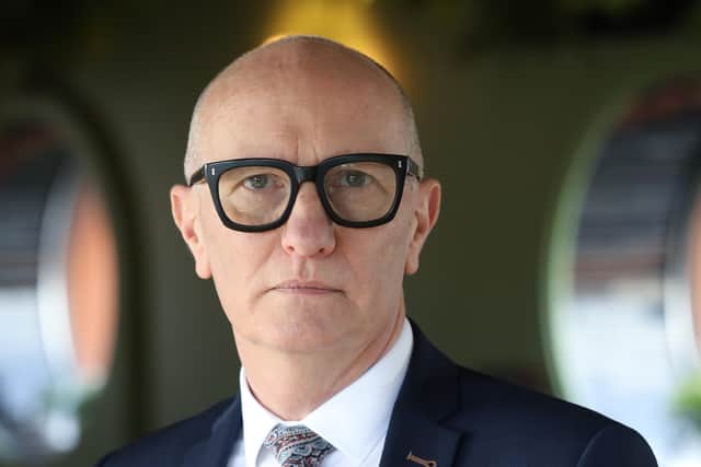 Hospitality Ulster's Colin Neill says support promised by the Executive must come urgently.