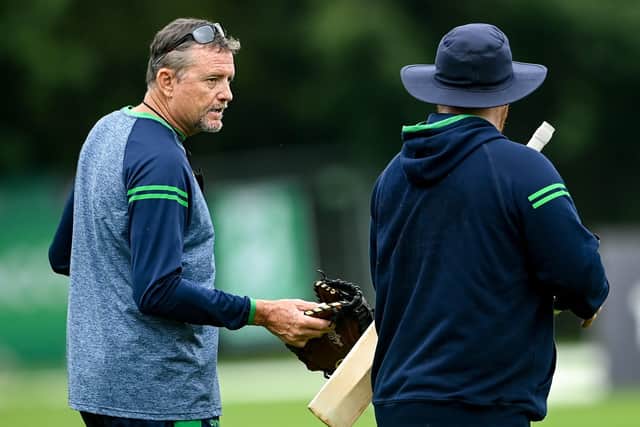 Ireland head coach Graham Ford, left, in conversation with Paul Stirling. Photo by Ramsey Cardy/Sportsfile.
