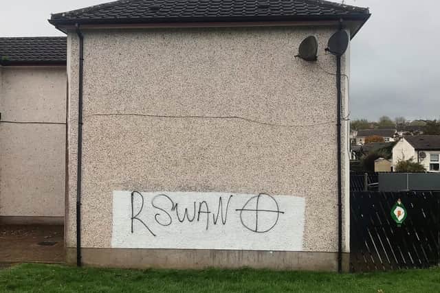 Graffiti  appeared overnight in the Newell Road area of Dungannon threatening the Health Minister Robin Swann. Photo: Presseye