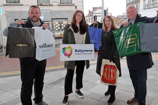 Roy Smyth, Outdoor Adventure, Clare Moore and Emma McCrea, BID and Hugh Black, Tower Centre at the recent Discount Day
