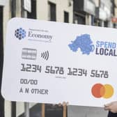 Economy Minister Gordon Lyons promoting the Spend Local card scheme.