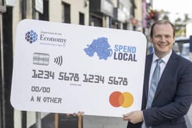Economy Minister Gordon Lyons promoting the Spend Local card scheme.