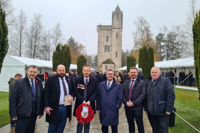 DUP leader Sir Jeffrey Donaldson with party colleagues at the Ulster Tower