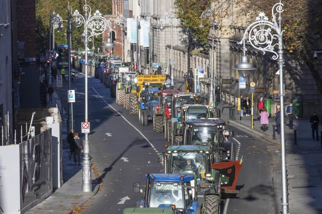 A convoy of farmers passing through Dublin city centre to call on the Irish government to listen to their concerns on the common agricultural policy and the Climate Action Plan. Photo: Finbarr O'Rourke/PA Wire