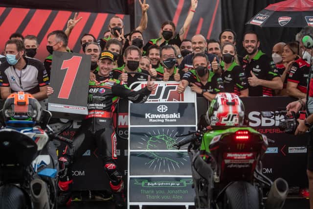 Jonathan Rea celebrates with his Kawasaki team after winning both races at the final round of the 2021 World Superbike Championship in Indonesia on Sunday.