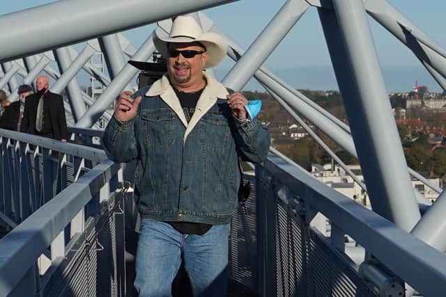 Country music star Garth Brooks on the roof of Croke Park in Dublin to promote his two Irish concerts which will take place next September