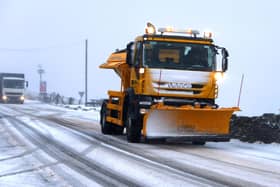 A gritter and snow plough