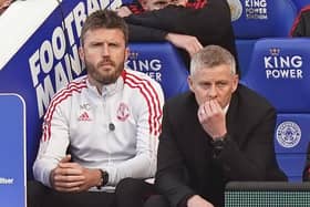 Michael Carrick (left) with Ole Gunnar Solskjaer on the Manchester United sidelines. Pic by PA.