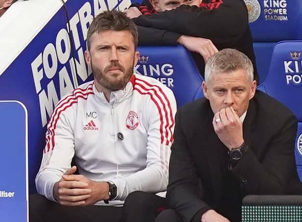Michael Carrick (left) with Ole Gunnar Solskjaer on the Manchester United sidelines. Pic by PA.