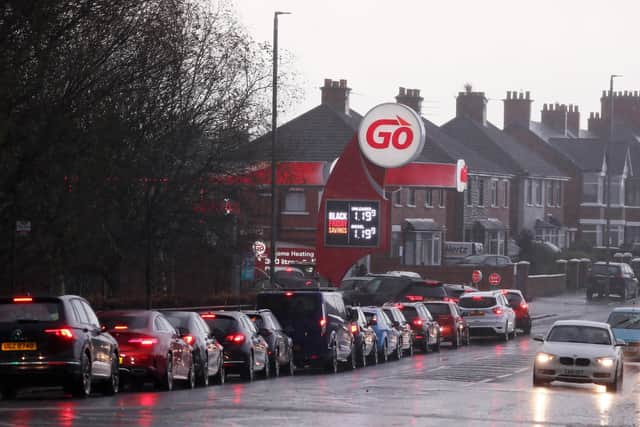 Car owners queue at the GO garage on Grand Parade, east Belfast, to take advantage of the Black Friday fuel prices. 

Picture by Jonathan Porter/PressEye