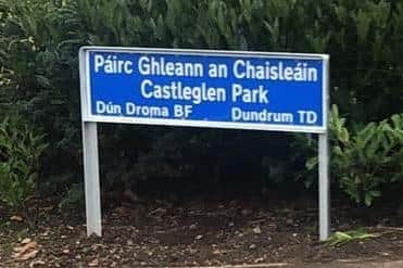 A resident has complained about the erection of bi-lingual signs in Castleglen Park in Dundrum.