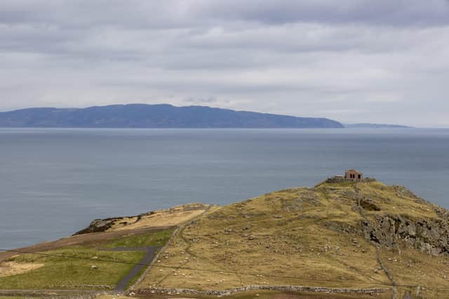 A view from Torr Head on the north Antrim coast looking over the Straits of Moyle towards the tip of the Mull of Kintyre in southwest Scotland which is a distance of 12 miles at its closest