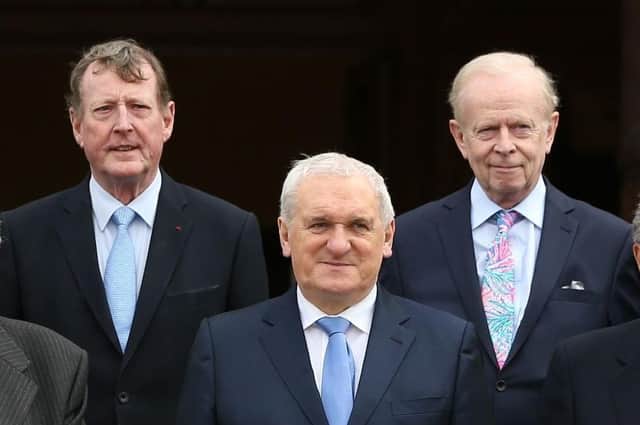 Bertie Ahern in front of Lord (David) David Trimble and Sir Reg Empey in Belfast i 2018 on the 20th anniversary of the Belfast Agreement. In 1998 Ahern crucially agreed to water down the North-South arrangements which if stronger would have resulted in the Ulster Unionists not signing up to the deal. Photo: Brian Lawless/PA Wire