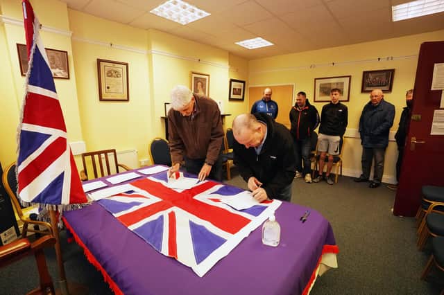People queue up at Carlton Street Orange Hall in Portadown to sign a declaration in opposition to the Northern Ireland Protocol. Picture date: Saturday November 27, 2021.