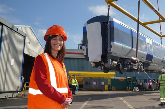 Minister Nichola Mallon has just launched a review of the all-island rail network. Here, she is seen welcoming new train carriages for NI in March.