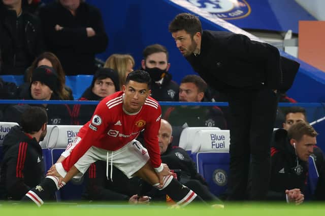 Manchester United's Cristiano Ronaldo takes instructions from interim manager Michael Carrick. Pic by Getty.