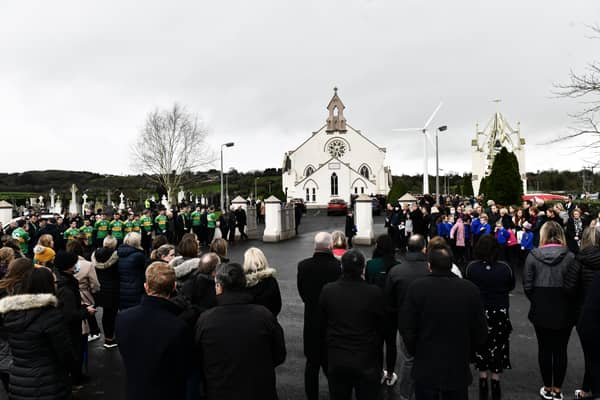 Family and friends gather for the funeral of school principal Francis Lagan at St Patrick's Church, Glen. 
He was principal of St Mary's Primary School in Maghera.
 His car was hit by the tree while travelling on the Dublin Road near Antrim, as Storm Arwen hit Northern Ireland on Friday.
 Pic Colm Lenaghan/ Pacemaker