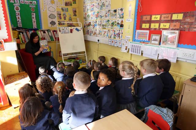 Pupils at Braniel Primary School listen intently following the return to school in March