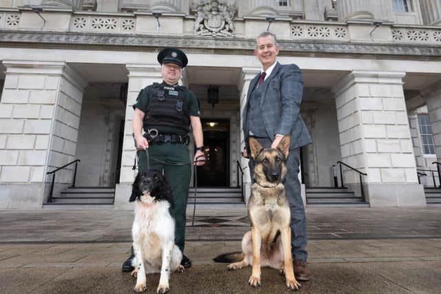 Deara minister Edwin Poots with PSNI Chied Inspector Chris Hamill and service dogs